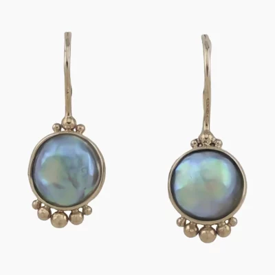 A pair of natural abalone pearl shepards hook style earrings with rare granulation accents from Mendocino, California measuring 9mm. Set in 14-karat yellow gold.