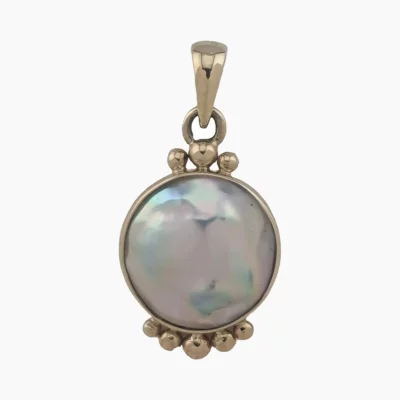 Pendant with a natural abalone pearl measuring 12mm round from Mendocino, California. Set in solid 14-karat yellow gold .