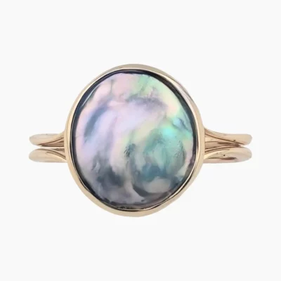 Ring with a natural oval abalone pearl measuring 12 x 10mm from Mendocino, California, set in solid 14-karat yellow gold.