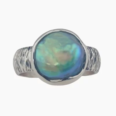 Ring with a natural abalone pearl measuring 11mm from Mendocino California set in sterling silver.
