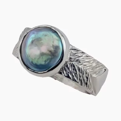 Ring with a natural abalone pearl from Shelter Cove, California measuring 10mm set in sterling silver.