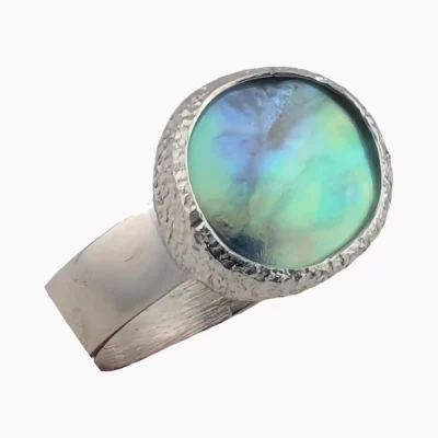Ring with a natural abalone pearl measuring 13mm from Mendocino, California set in sterling silver.