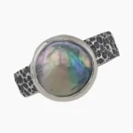 Ring with a natural abalone pearl measuring 10mm from Mendocino, California set in sterling silver.