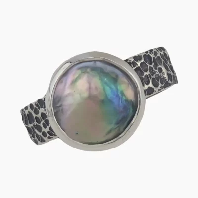 Ring with a natural abalone pearl measuring 10mm from Mendocino, California set in sterling silver.