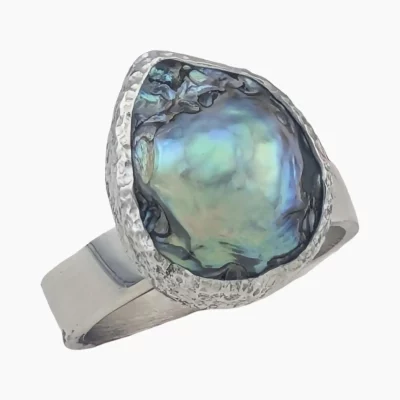 Ring with a natural abalone pearl from Mendocino, California. Pear-shaped, measuring 16 x 12mm, set in sterling silver.