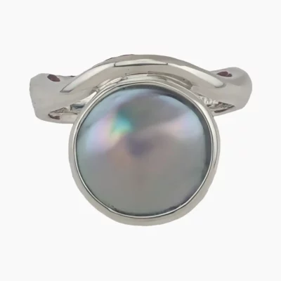 Ring with a natural abalone pearl from Mendocino, California, measuring 12mm. Set in sterling silver.
