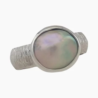 Ring with a natural abalone pearl from Mendocino, California, measuring 13mm. Set in sterling silver.