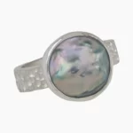 Ring with a natural abalone pearl from Mendocino, California, measuring 12mm. Set in sterling silver.