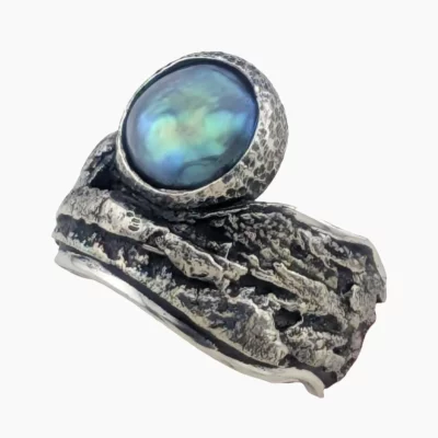 Ring with natural abalone pearl from Mendocino, California, measuring 9mm. Set in sterling silver.
