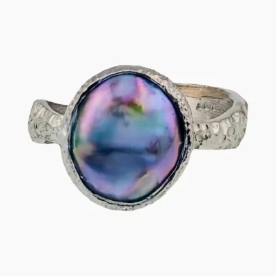Ring with a rare natural lavender abalone pearl featuring a 13 x 11mm oval pearl from Mendocino, California, set in sterling silver.