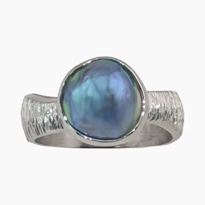 Ring with a natural abalone pearl from Ocean Cove, California measuring 11mm set in sterling silver