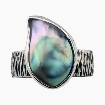 Ring set with a natural freeform-shape abalone pearl measuring 19 x 13mm from Mendocino, California, set in sterling silver.