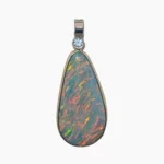 Pendant with a rare 2.66-carat pear-shaped opal from Lambina, Australia measuring 18 x 10mm set in solid 14-karat yellow gold with a 2.4mm round 0.05-carat VS1G quality diamond accent.