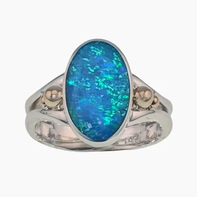 Ring with a 1.88-carat oval opal from Lambina, Australia measuring 9 x14mm set in sterling silver with solid 14-karat yellow gold accents.