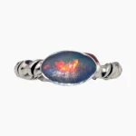 Ring featuring an oval 2.1-carat opal from Ethiopia measuring 12 x 7mm set in sterling silver.