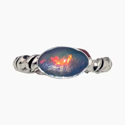 Ring featuring an oval 2.1-carat opal from Eithyopia measuring 12 x 7mm set in sterling silver.