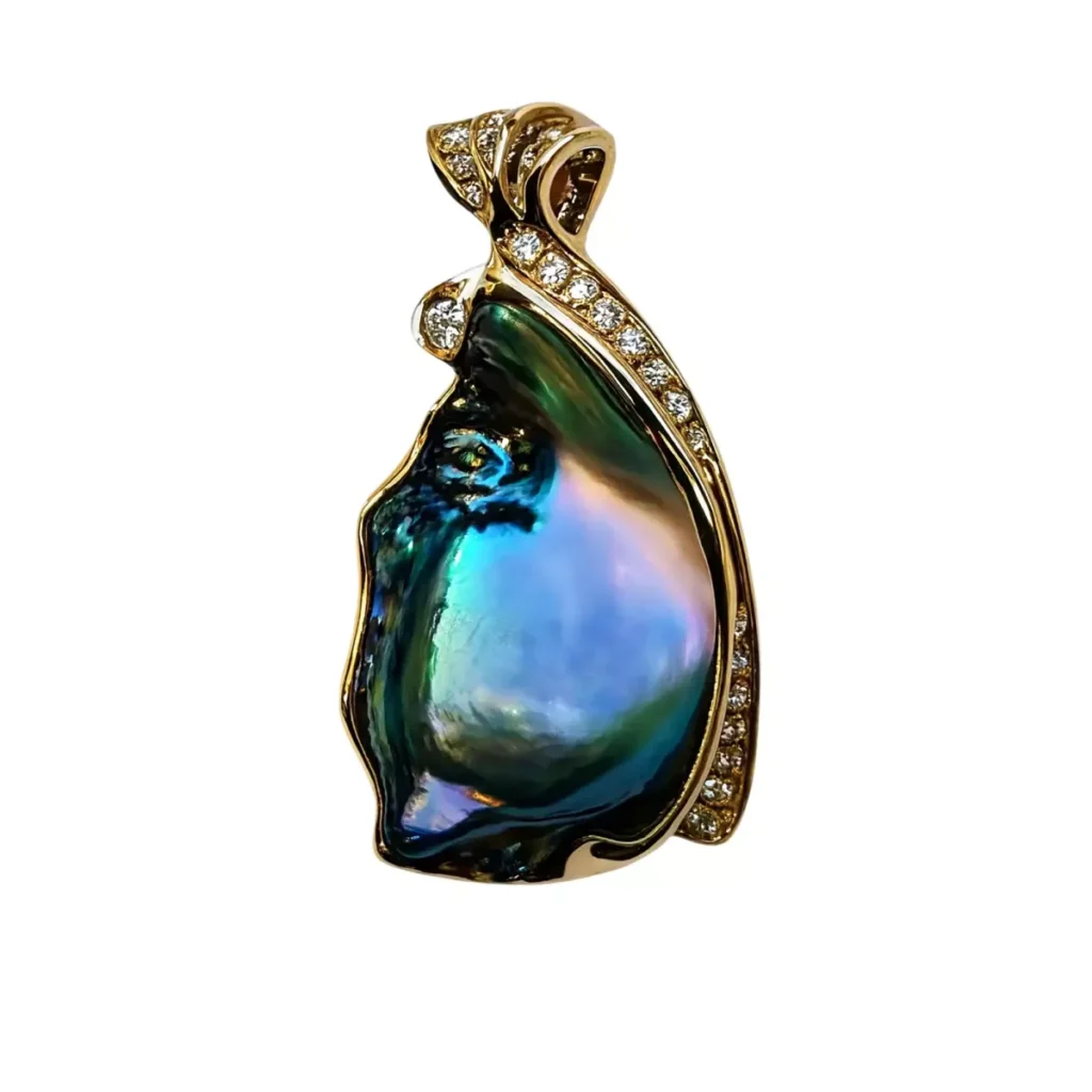 Abalone blister pearl pendant wrapped in a diamond-set gold ribbon bail