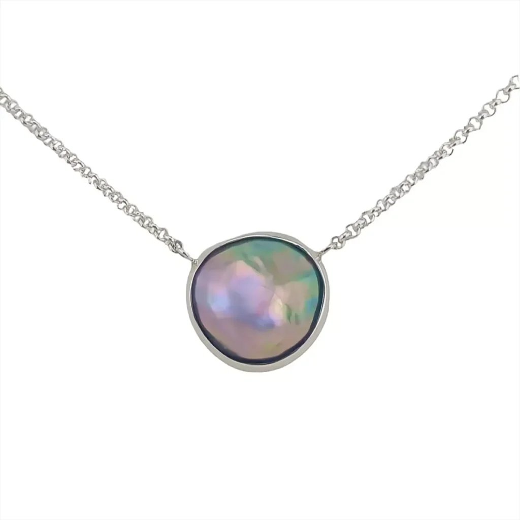 Round abalone mabe pearl solitaire necklace in a polished silver bezel