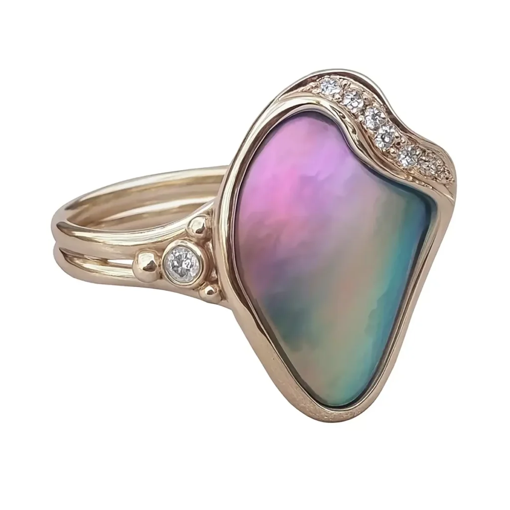 Pink and blue abalone pearl ring in gold with a wave of pave diamonds