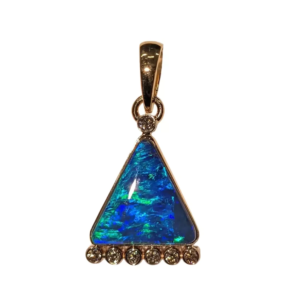 Triangular blue-green opal pendant in gold with a row of six diamonds
